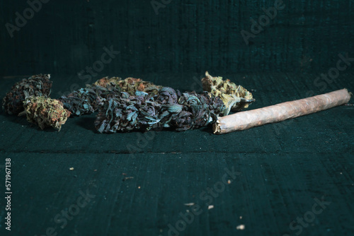 Marijuana with buds on wood 