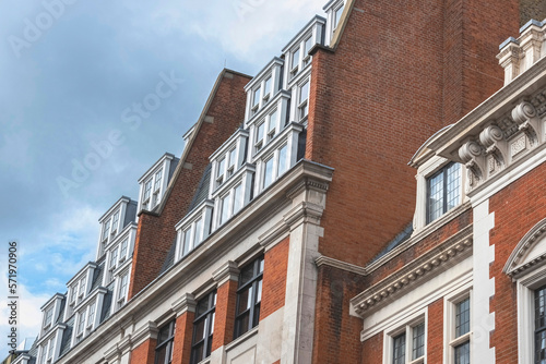 Facade of a building with mansards arranged in levels. 