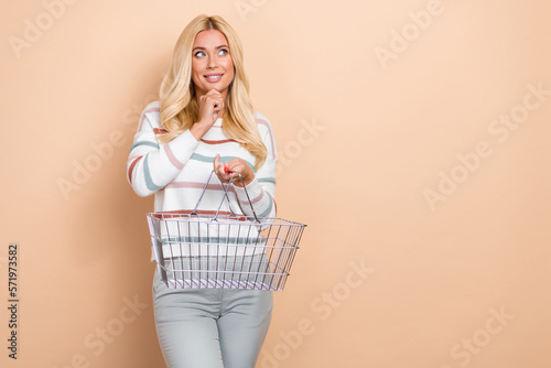 Photography Photo of dreaming smart lady choosing best offer proposition price hold shopping