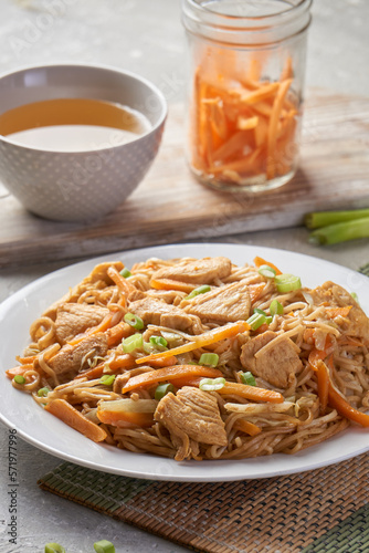 Chicken chow popular oriental dish with noodles and vegetables