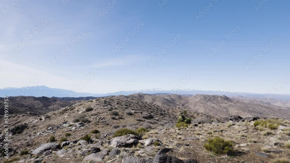 View from the summit of Quail Mountain, the highest peak in Joshua Tree National Park, a popular destination in California’s Mojave Desert. The snow-capped San Bernardino mountains rise in the west. View from the summit of Quail Mountain, the highest peak in Joshua Tree National Park, a popular destination in California’s Mojave Desert. The snow-capped San Bernardino mountains rise in the west.