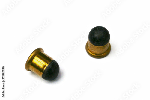 Two .22 BB caps on white background photo