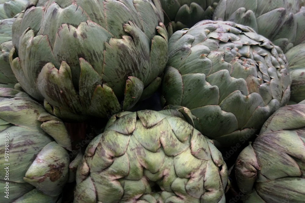 Fototapeta premium Stack of artichokes on a market stall