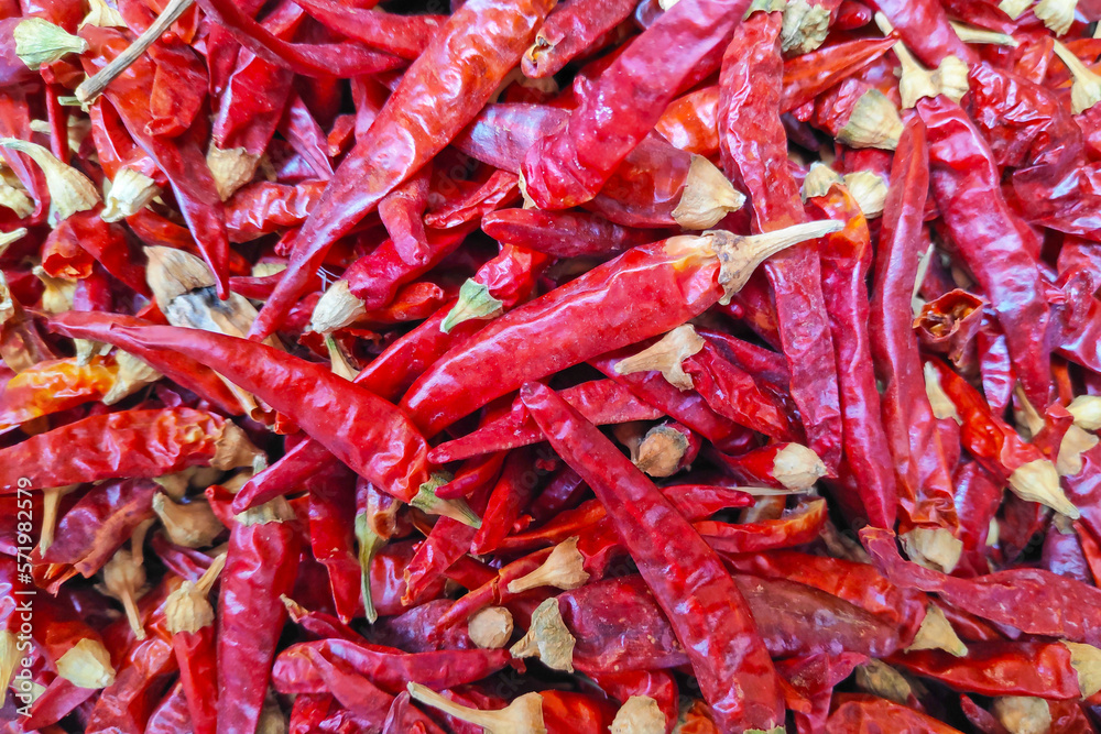 Stack of Moroccan dried red chili pepper on a market stall Stack of Moroccan dried red chili pepper on a market stall
