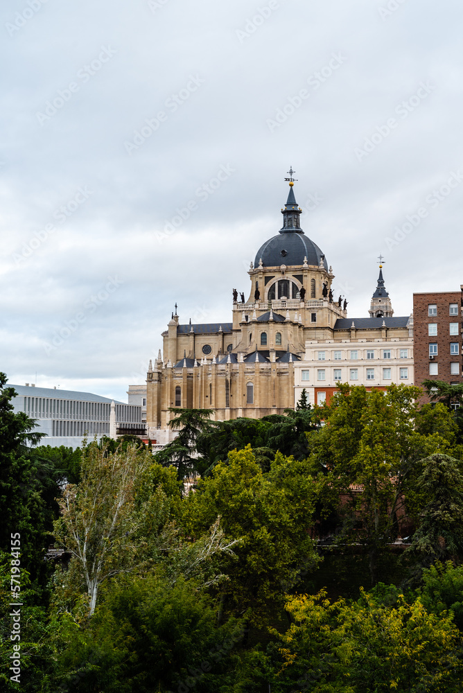 Almudena Cathedral and Vistillas Park in Madrid. Cloudy day. Vertical photography