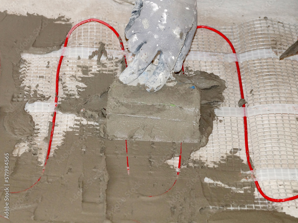 installation of an electric underfloor heating under a concrete screed