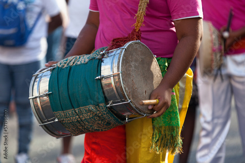 Bilde på lerret Percussionist playing with a dholak during the carnival of Grand Boucan