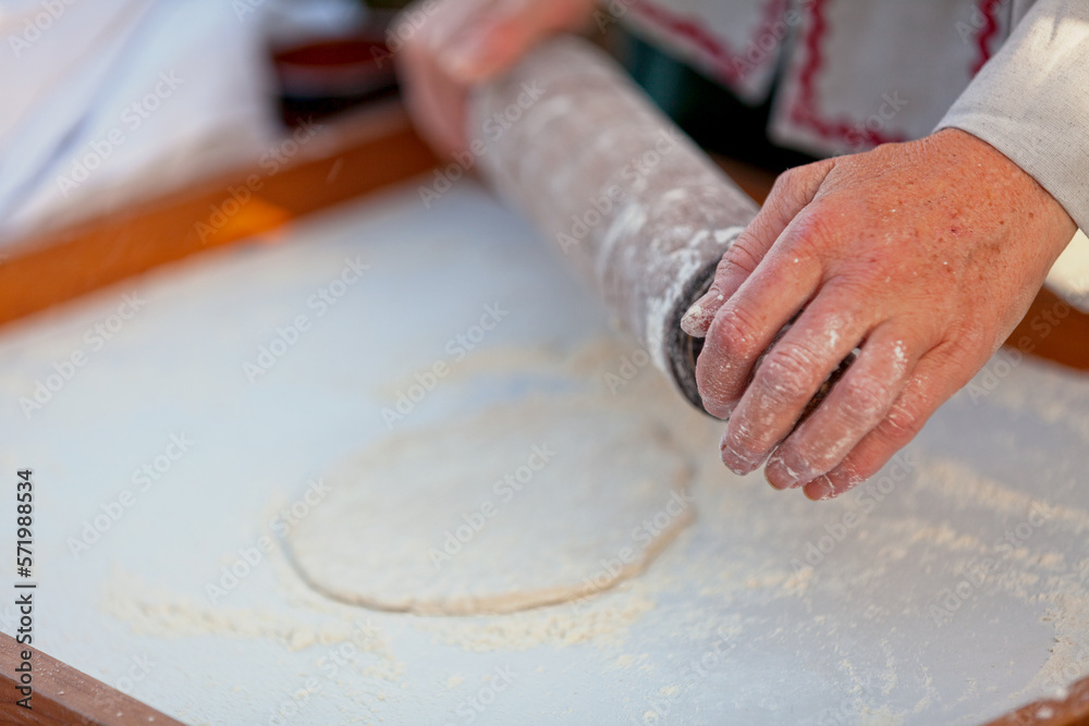 Medieval baker making a fouace Medieval baker making a fouace