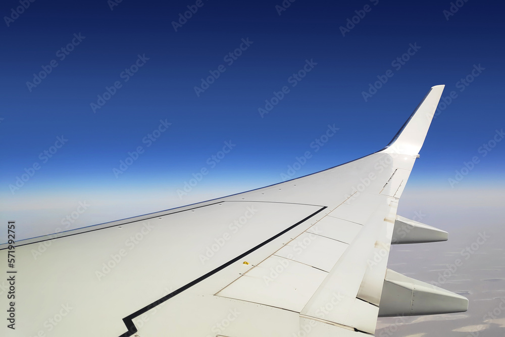 Commercial airplane wing in flight