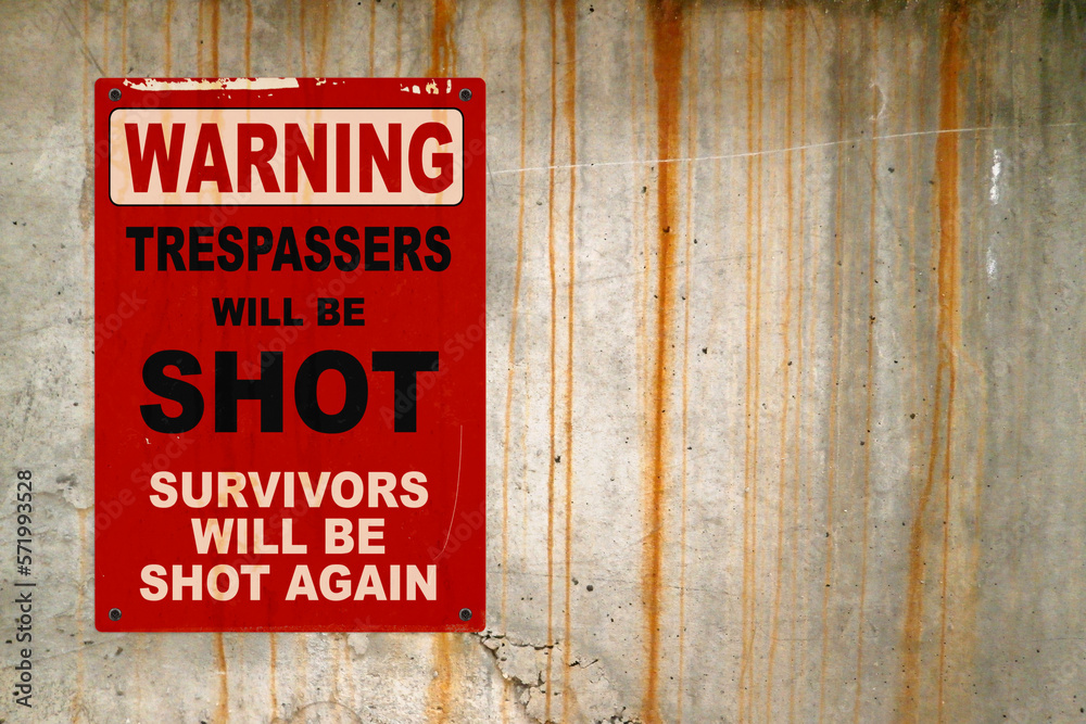 Naklejka premium Warning - Trespassers will be shot, survivors will be shot again