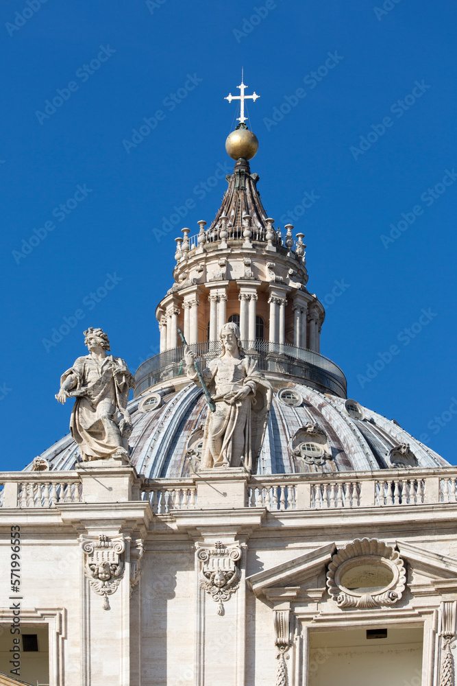 Dome of Saint Peter's Basilica at St.Peter's square on background of blue sky, Vatican, Rome, Italy.