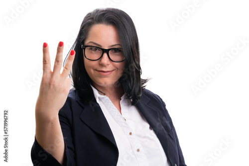 Smiling female entrepreneur presenting number three with fingers