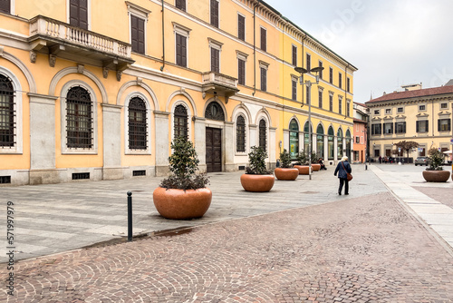 People walking in the city center of Novara, Italy photo