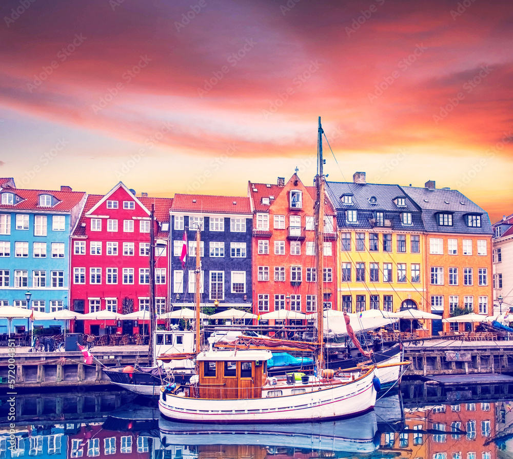 magical fascinating landscape with boats in a famous Nyhavn in the capital of Denmark Copenhagen. Exotic amazing places. Popular tourist atraction.