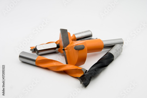 Woodworking  router bit. Rotating cutting tool. Professional cutting tools used for woodworking.
Stainless Drill bit. photo