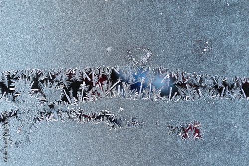 Closeup of frost on the car windshield © abentson