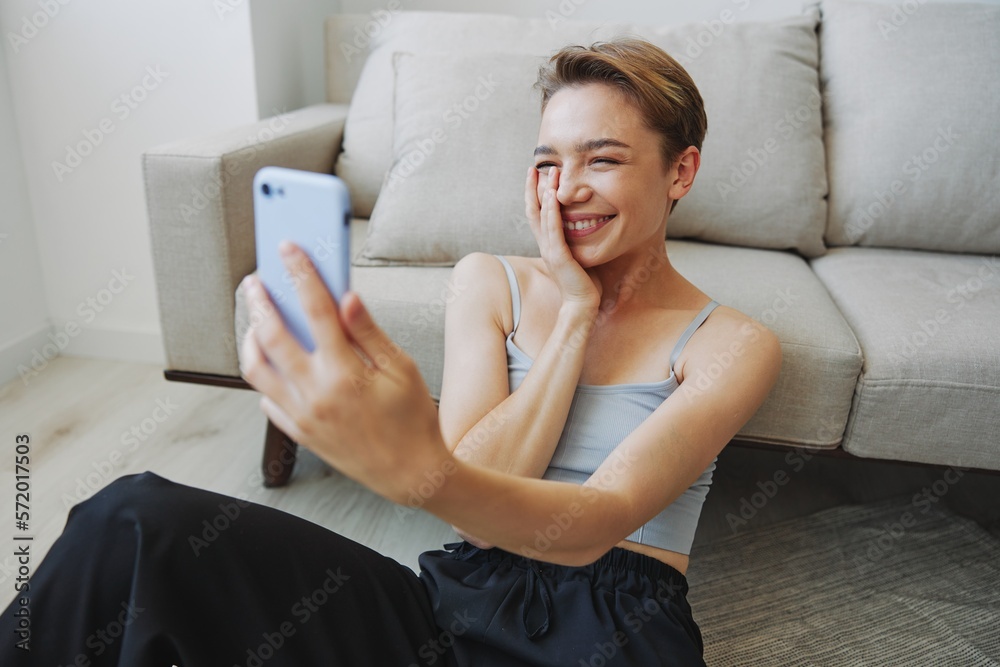 Woman blogger selfies on phone, selfies and online conversations for followers, teenager develops social media, freelancer from home Woman blogger selfies on phone, selfies and online conversations for followers, teenager develops social media, freelancer from home