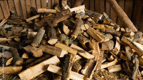 Firewood for the oven. Wood preparation. Chopping wood. Household. Cutting with an axe.