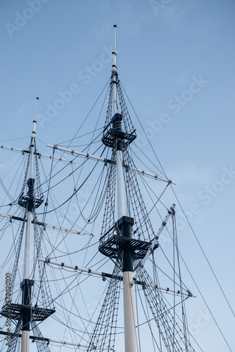 Vintage ship on the river in a big city in winter.