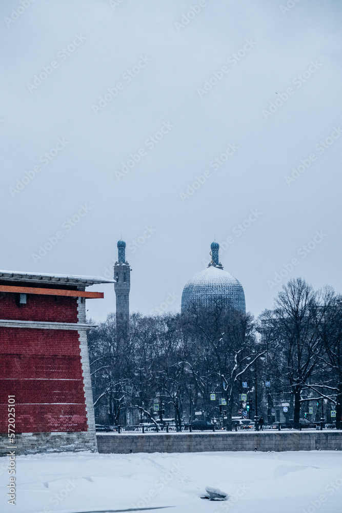 Beautiful winter view of the temple and the embankment. Beautiful winter view of the temple and the embankment.