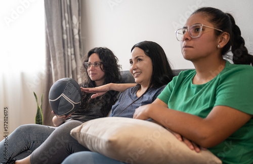 young womens watching rugby 