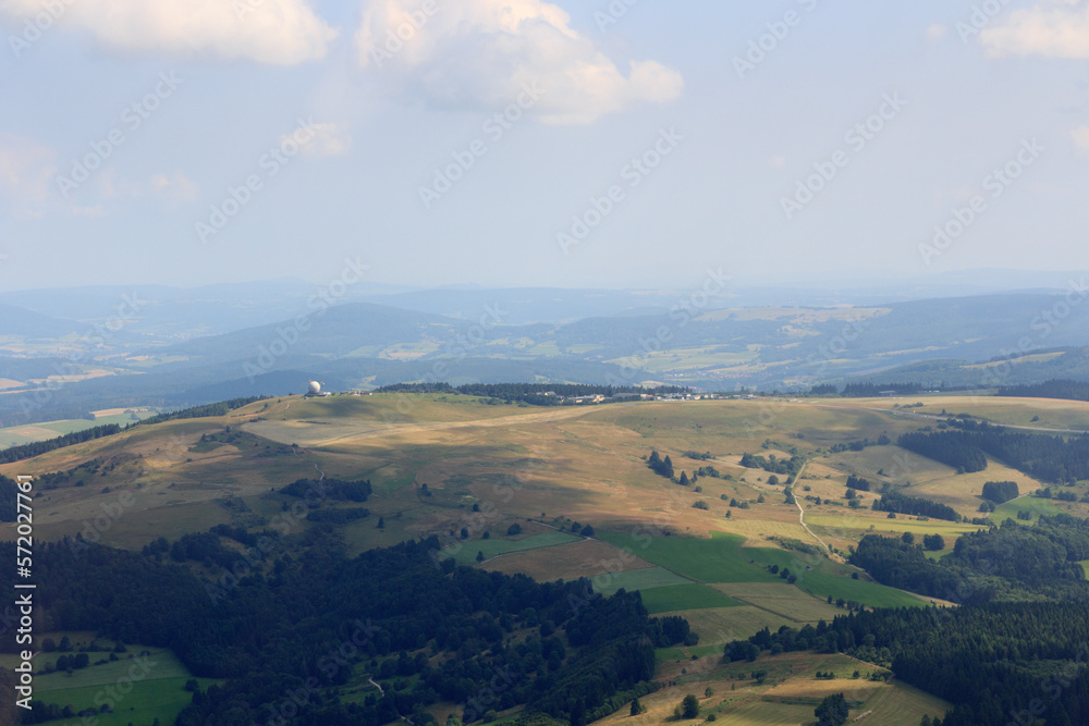 Mountain Wasserkuppe panorama with radar station (radar dome) and airfield in Rhön Mountains, Germany