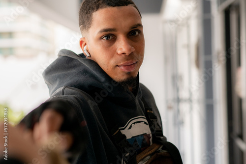 close-up of fast food delivery man. Dominican man, Latin delivery man