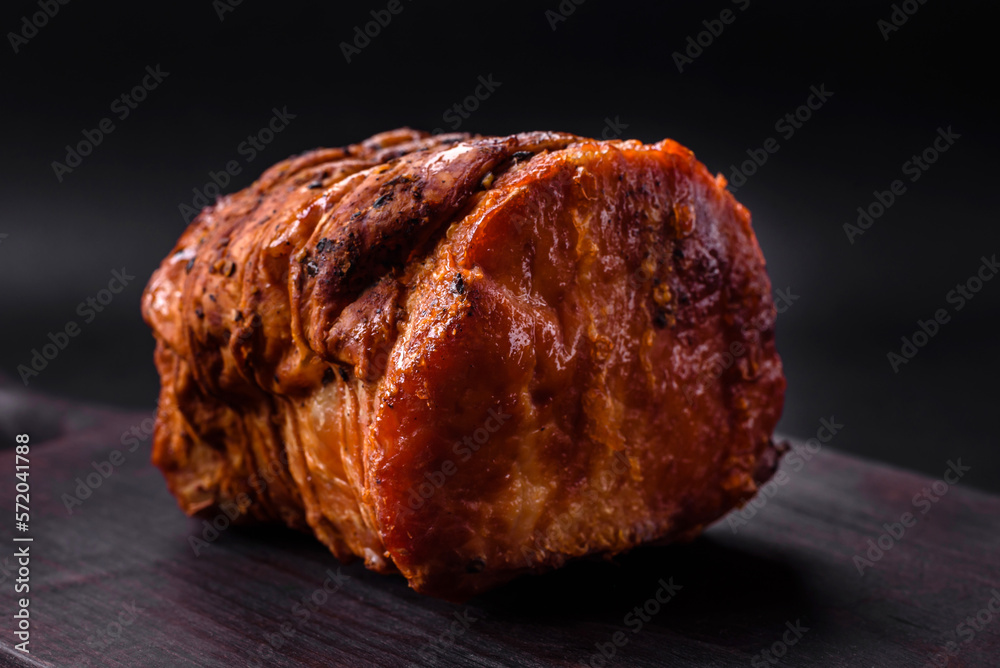 Delicious fresh smoked meat or ham with spices and herbs Delicious fresh smoked meat or ham with spices and herbs