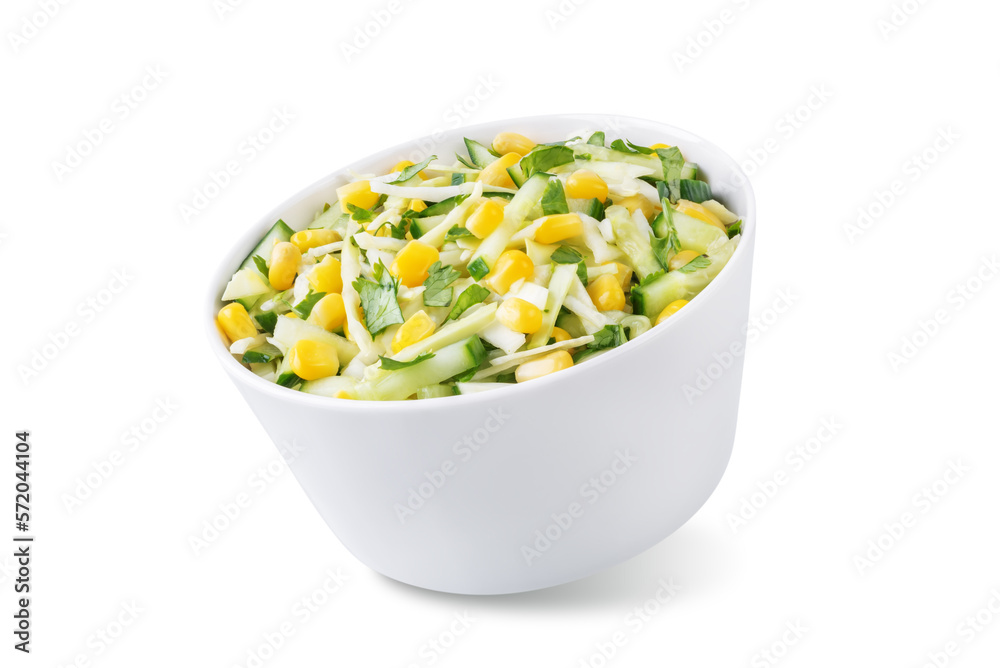 Cabbage cucumber corn salad in a bowl on a white isolated background Cabbage cucumber corn salad in a bowl on a white isolated background
