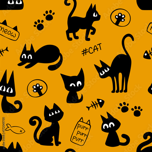 Cute cartoon black cats halloween seamless pattern. Cats background for halloween and other design. Funny cats, inscriptions and paws on a yellow-orange background.
