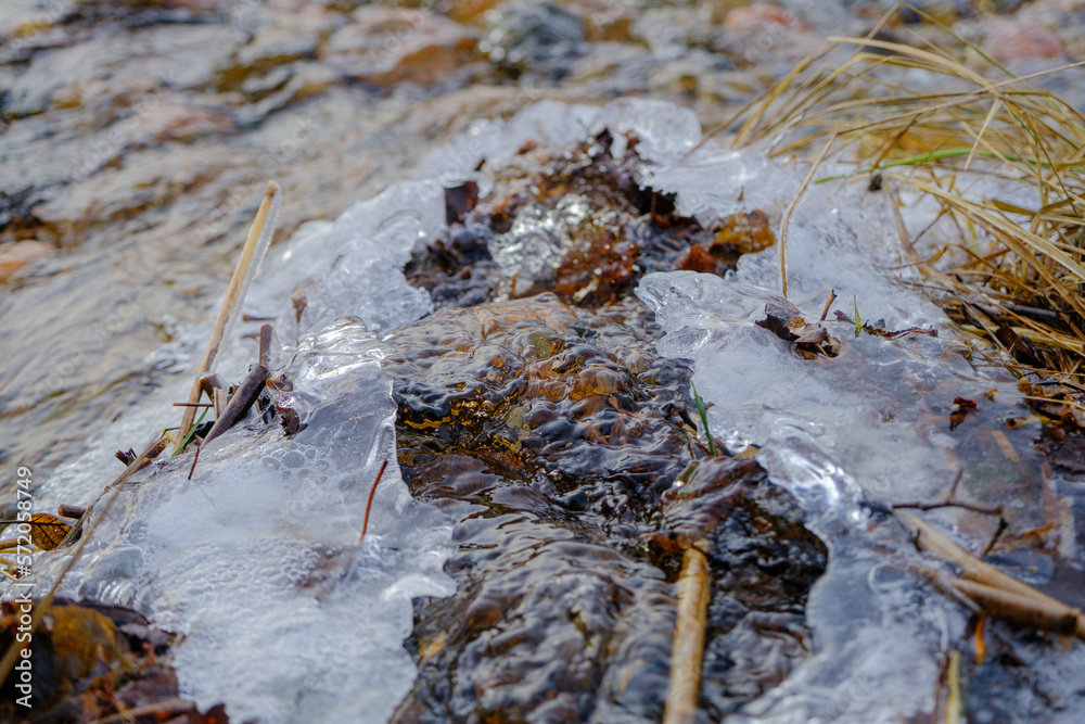 flowing stream water with bubbles and foam. flowing stream water with bubbles and foam.