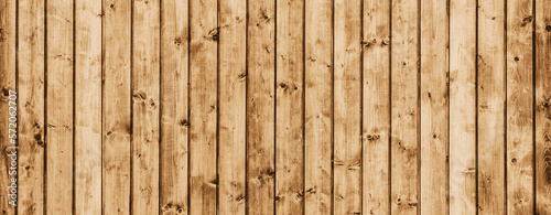 Panoramic wood texture. Brown wooden wall background. Rustic desks with knots pattern. Countryside architecture wall. Village building construction. Website header backdrop. Rusty grunge wood texture.