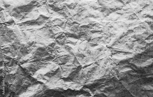Fototapeta Naklejka Na Ścianę i Meble -  old crumpled tarpaulin,monochrome texture background,