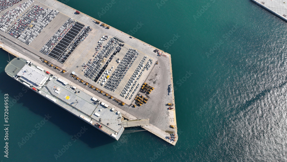 Aerial drone top down photo of international car terminal and Ro Ro boat anchored in Keratsini area, Piraeus, Attica, Greece