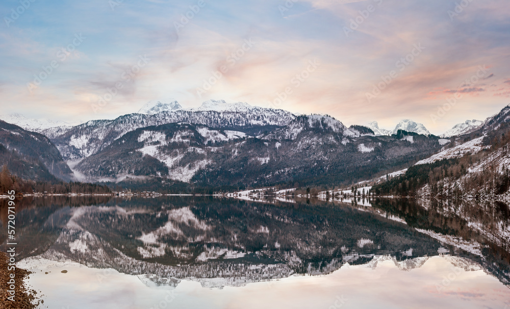 Winter dusk Alpine  lake Grundlsee panorama (Austria) with fantastic pattern-reflection on the water surface.