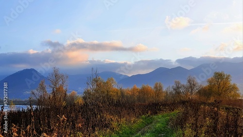 autumn landscape with blue mountains and blue sky