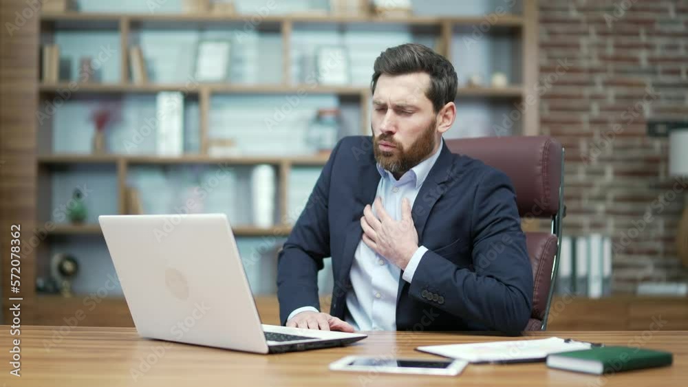 Scared bearded mature business man investor has panic attack difficulty breathing heart ache or chest pain touches breast with hand and try to calm down at desktop alone Mental health problem concept Scared bearded mature business man investor has panic attack difficulty breathing heart ache or chest pain touches breast with hand and try to calm down at desktop alone Mental health problem concept