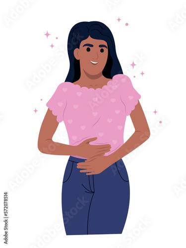 Beautiful smiling pregnant African-American girl hugs her belly with her hands. 1 trimester of pregnancy. Motherhood. Newborn. Young black mother.