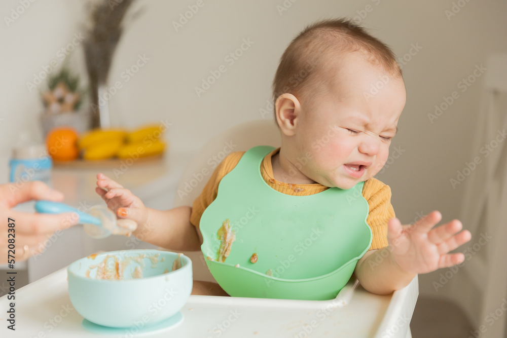 the kid does not want to eat food on the table the kid does not want to eat food on the table