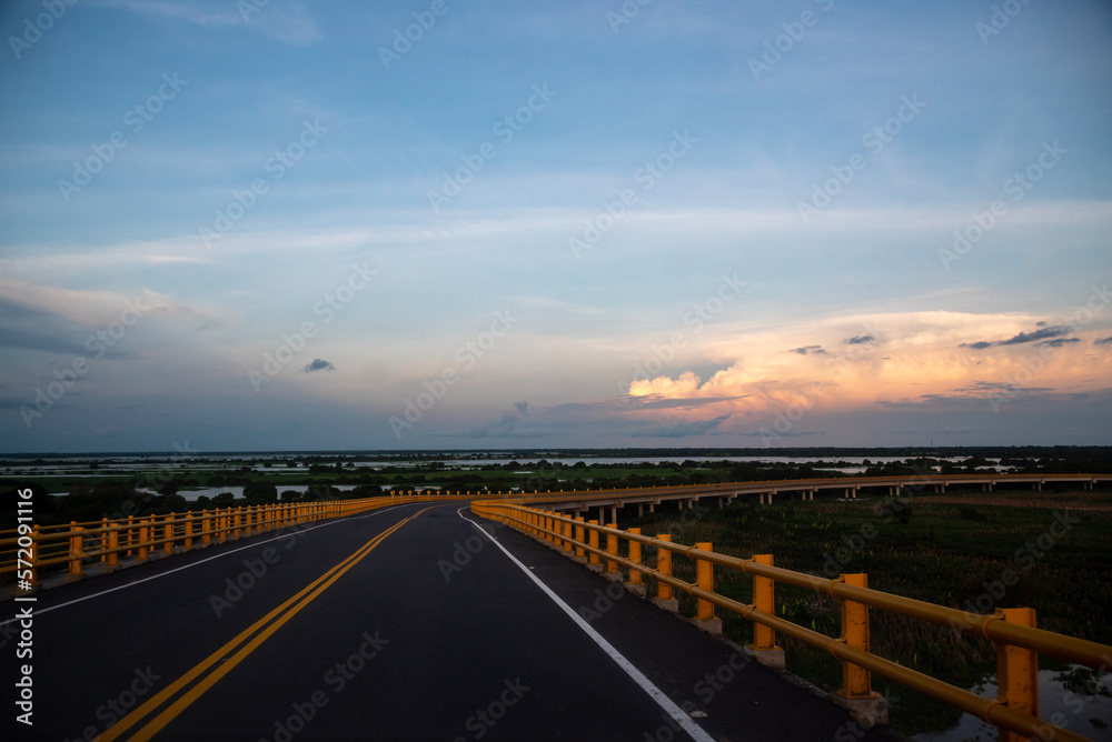 View from the El Roncador bridge over the Magdalena river at sunset. Colombia.