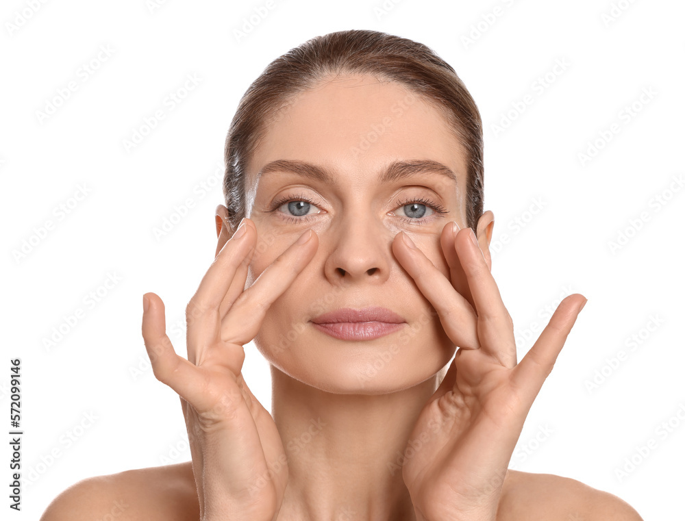 Woman massaging her face on white background Woman massaging her face on white background