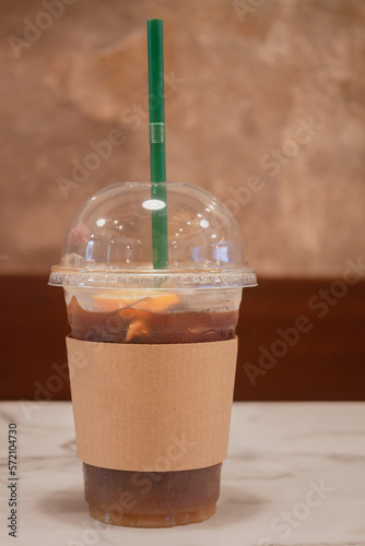 Iced coffee with orange in coffee shop