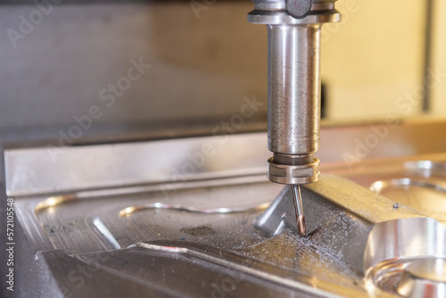 The broken cutting tool on CNC milling machine.
