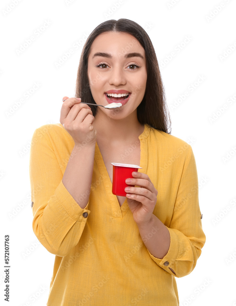 Happy woman eating tasty yogurt on white background Happy woman eating tasty yogurt on white background