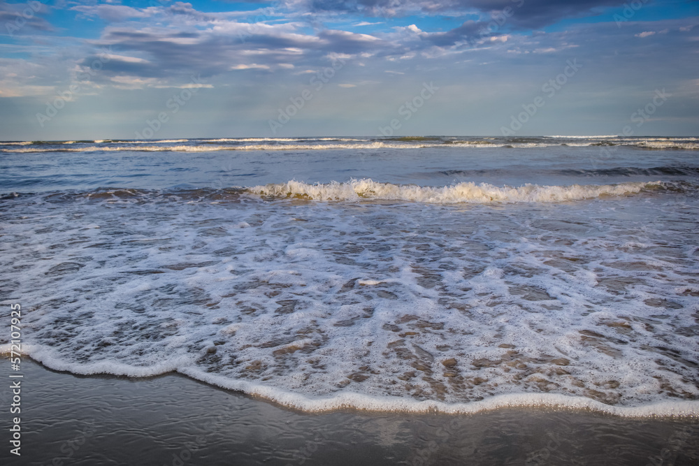 Secluded beach in Torres at dramatic evening, Rio Grande do Sul, Brazil