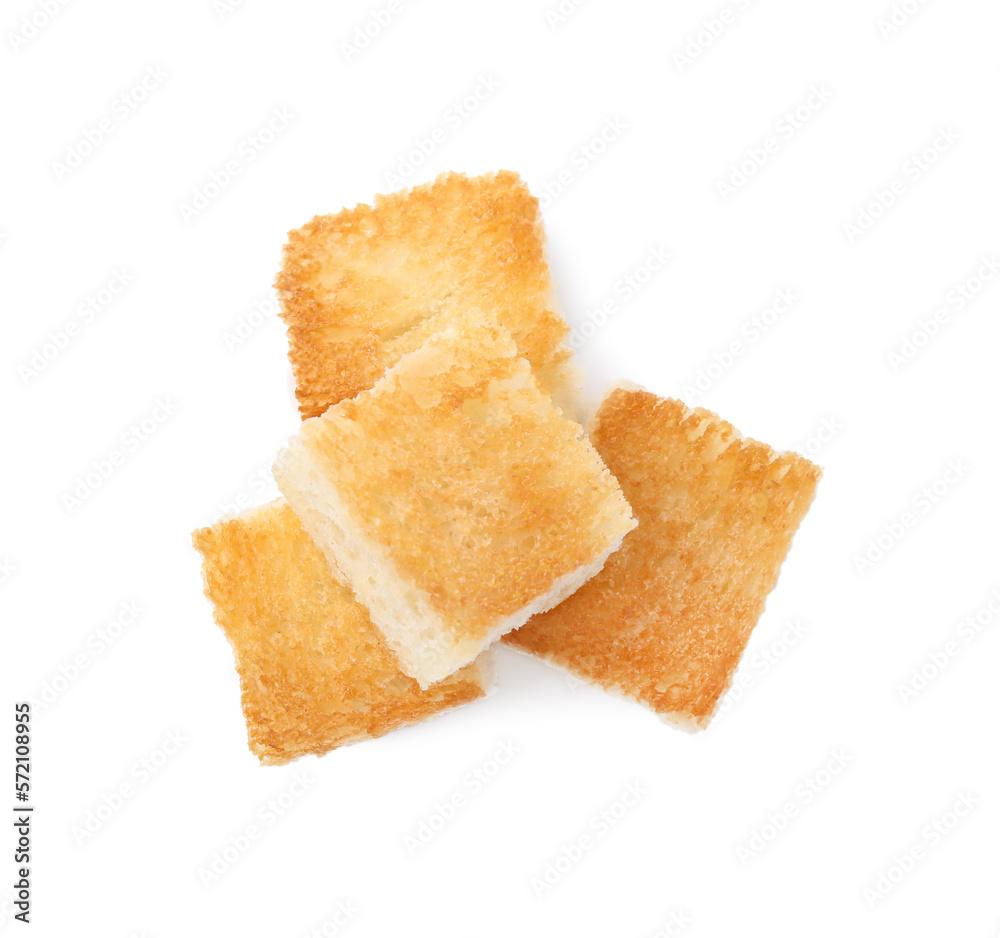 Delicious crispy croutons on white background, top view Delicious crispy croutons on white background, top view