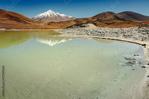 Obraz na płótnie Salt lake in Piedras Rojas, volcanic landscape at sunrise, Atacama, Chile w salonie