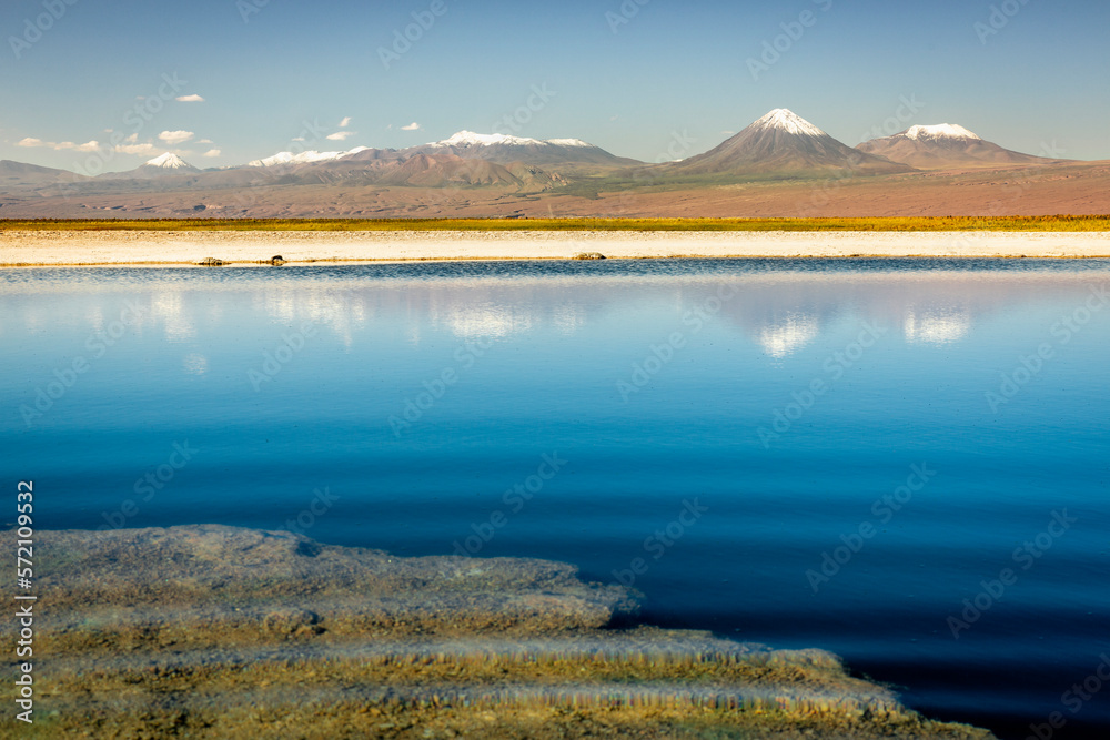 Licancabur with reflection lake and volcanic landscape at Sunset, Atacama, Chile