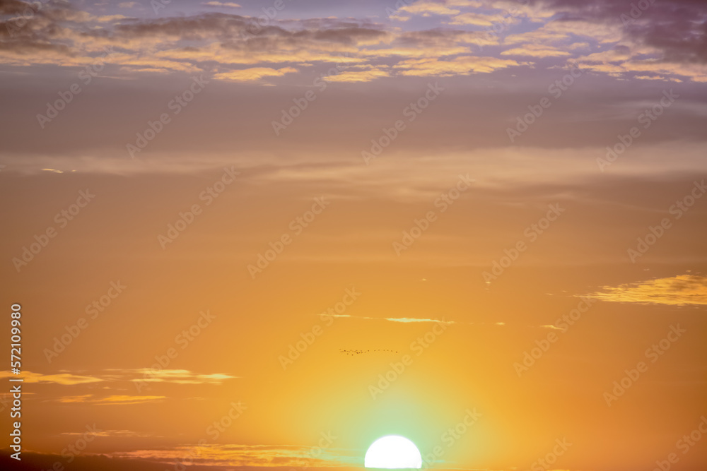 Rising sun and dramatic sky panorama sky with clouds on sunrise and sunset time