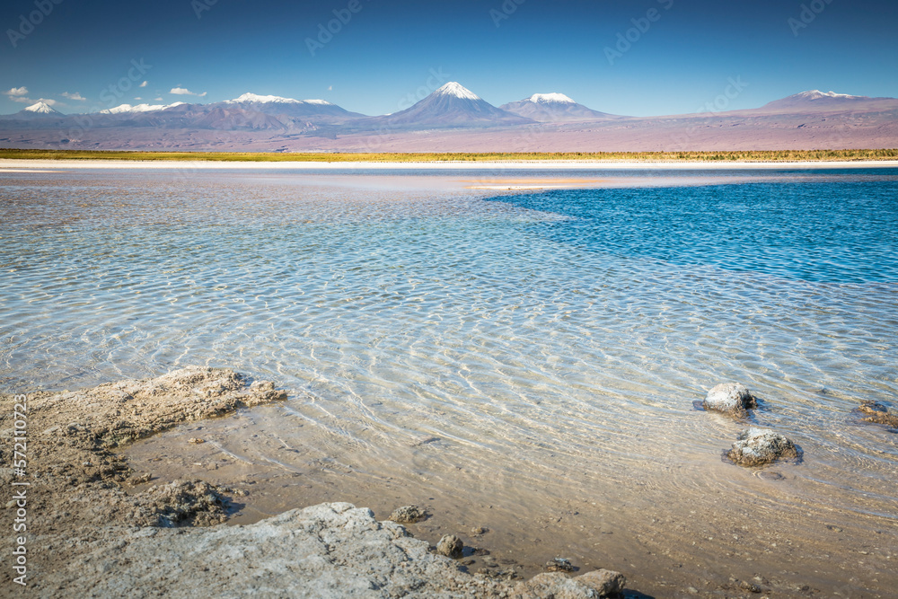 Licancabur with reflection lake and volcanic landscape at Sunset, Atacama, Chile